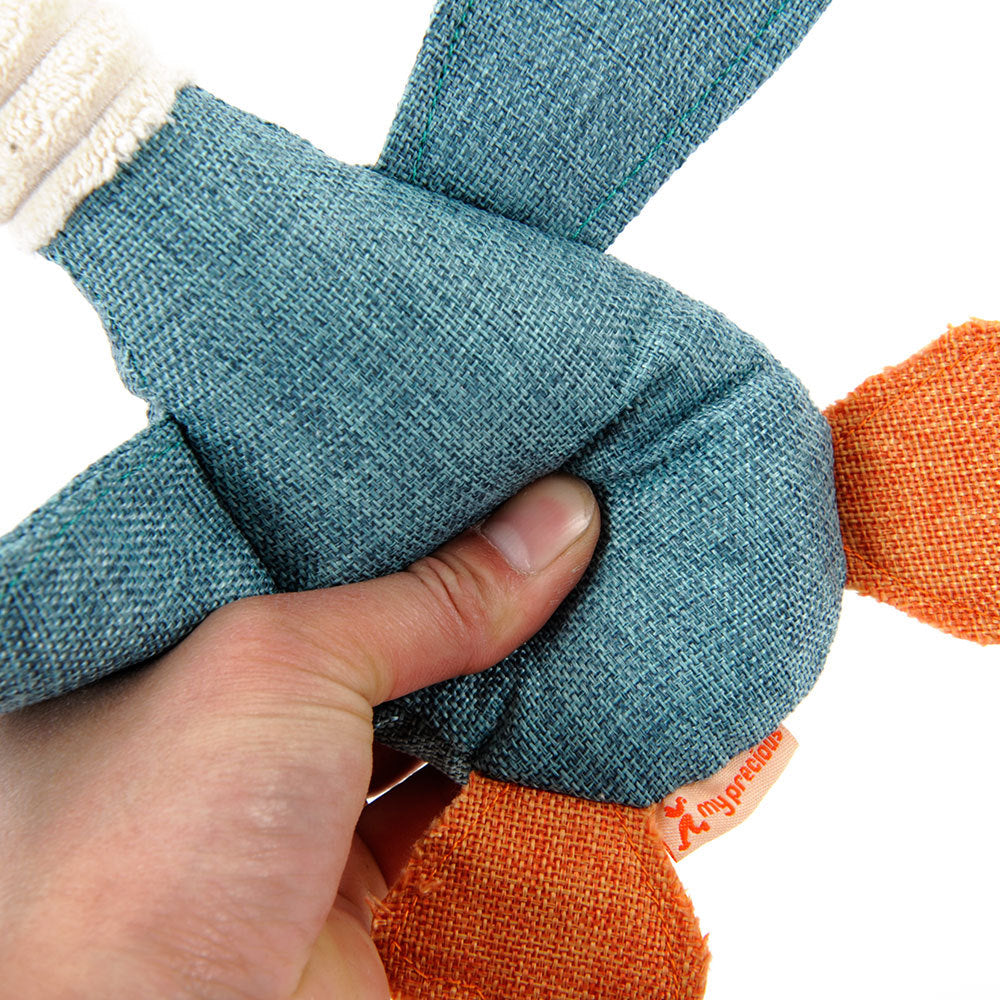Squishy plush goose dog toy in hand