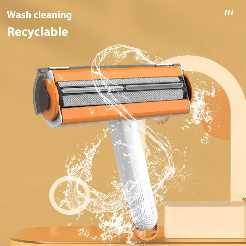Washable, reusable pet hair roller being rinsed