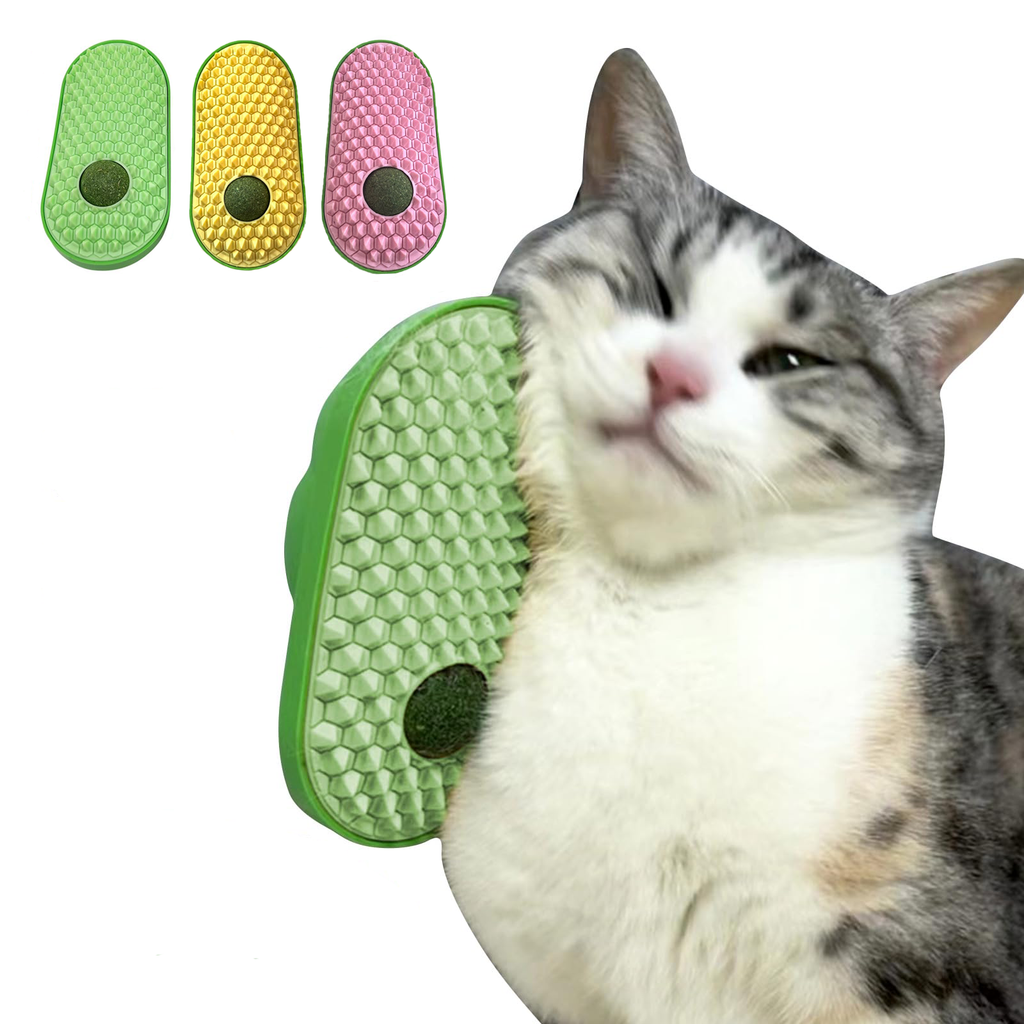 Cat rubbing face on a wall-mounted self groomer
